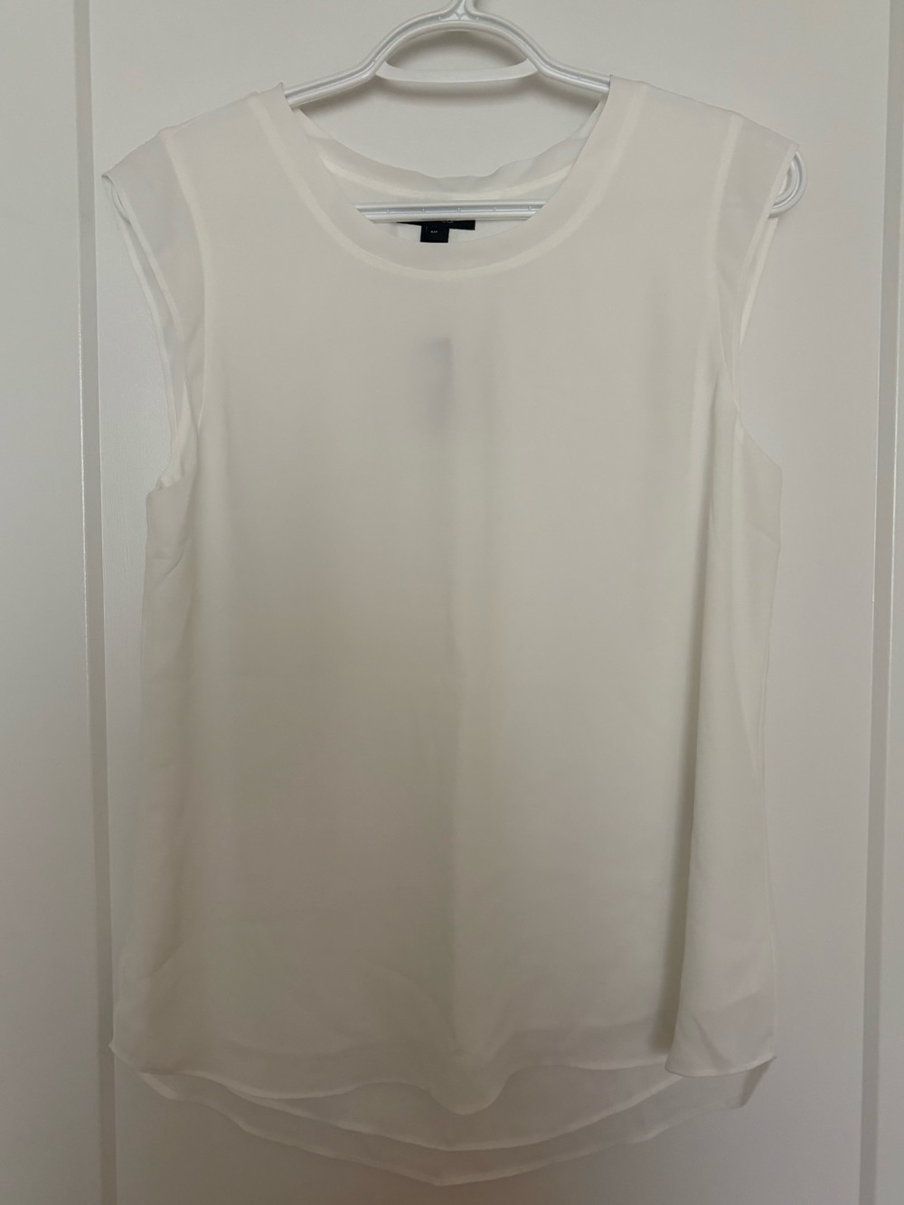 RW&CO. White Sleeveless Layered Hem Blouse